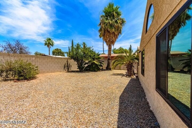 view of yard featuring a fenced backyard