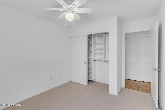 660 W Via Rosaldo, Green Valley, AZ 85614 - unfurnished bedroom with carpet flooring, a closet, and a ceiling fan