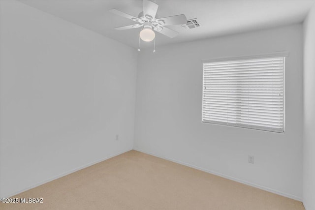 660 W Via Rosaldo, Green Valley, AZ 85614 - unfurnished room featuring light carpet, ceiling fan, and visible vents