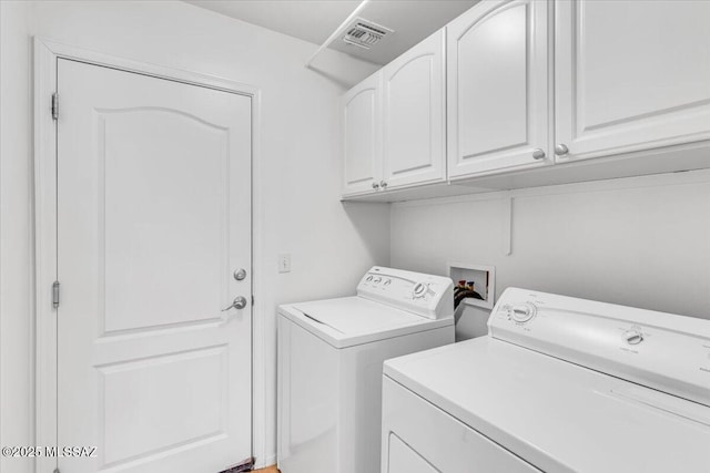 660 W Via Rosaldo, Green Valley, AZ 85614 - washroom with washing machine and dryer, visible vents, and cabinet space