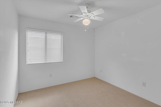 660 W Via Rosaldo, Green Valley, AZ 85614 - unfurnished room with a ceiling fan and carpet