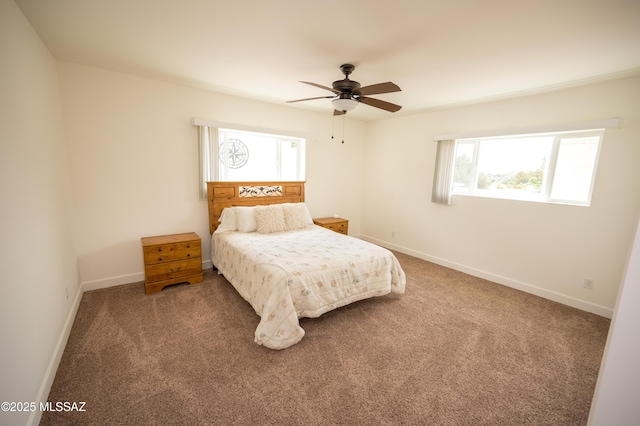 bedroom with baseboards, carpet, and a ceiling fan