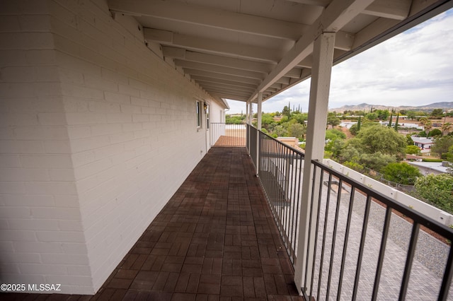balcony featuring a mountain view