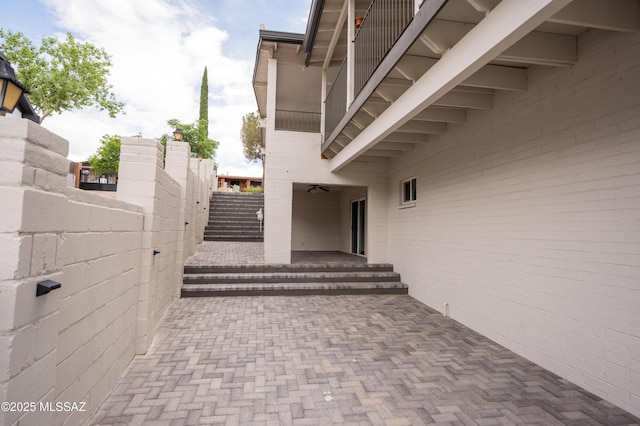 view of patio / terrace with stairway