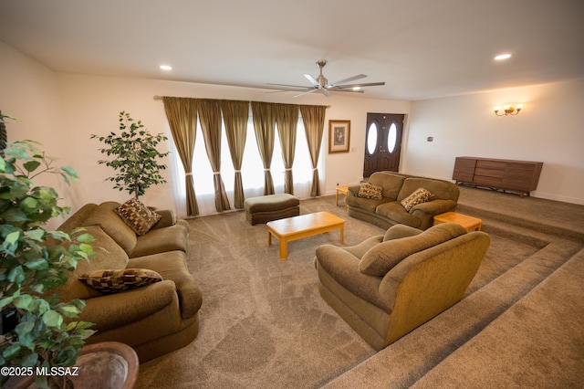 living area with ceiling fan, recessed lighting, and carpet