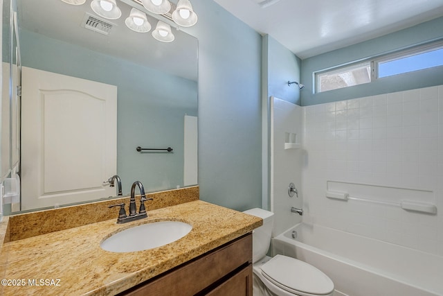 full bathroom with visible vents, vanity,  shower combination, and toilet