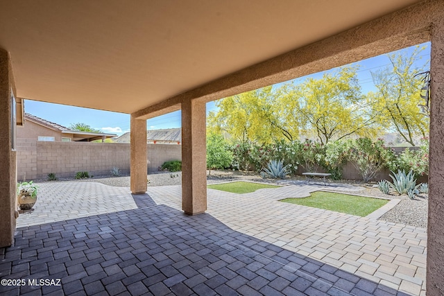 view of patio with a fenced backyard