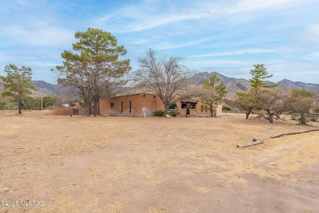 5374 E Spring Rd, Hereford, AZ 85615 - view of yard featuring a mountain view