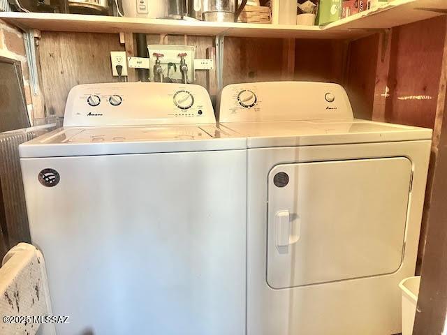 laundry area featuring independent washer and dryer and laundry area