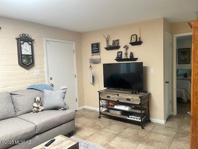 466 S Paseo Cerro Unit D, Green Valley, AZ 85614 - living area featuring baseboards and light tile patterned floors