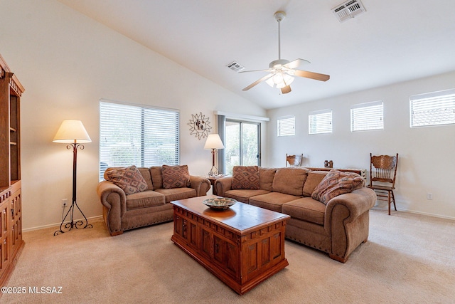 living room with ceiling fan, light carpet, vaulted ceiling, and visible vents