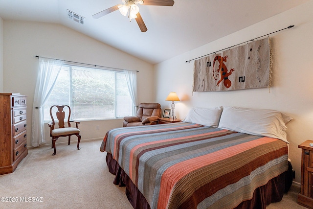 bedroom featuring ceiling fan, visible vents, vaulted ceiling, baseboards, and light carpet