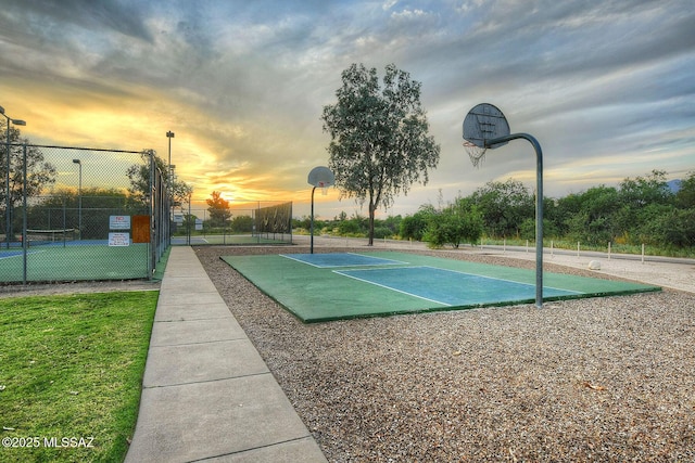view of sport court featuring fence and community basketball court