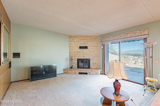 32551 S Moyza Ranch Rd, Amado, AZ 85645 - living room with carpet, baseboards, a fireplace, and a textured ceiling