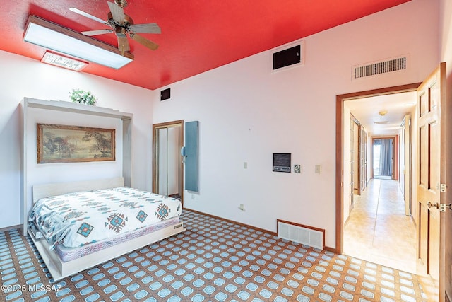 32551 S Moyza Ranch Rd, Amado, AZ 85645 - bedroom with baseboards, visible vents, and a closet
