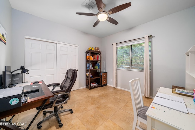 office area featuring visible vents, ceiling fan, light tile patterned floors, and baseboards