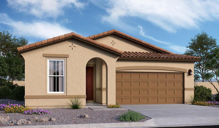 34960 S Stargazer Ave, Red Rock, AZ 85145 - mediterranean / spanish-style home with driveway, an attached garage, a tiled roof, and stucco siding