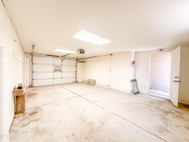 3926 E Camino De Palmas, Tucson, AZ 85711 - garage featuring a garage door opener
