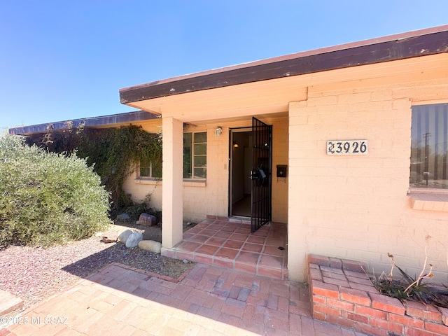 3926 E Camino De Palmas, Tucson, AZ 85711 - property entrance featuring concrete block siding