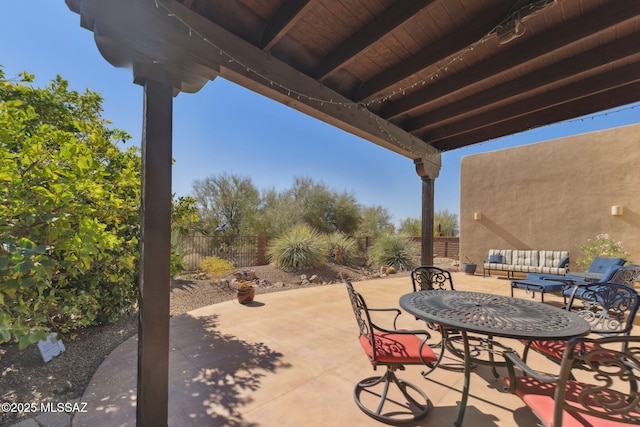 view of patio with an outdoor hangout area and a fenced backyard