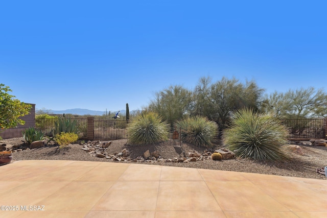 view of patio with fence