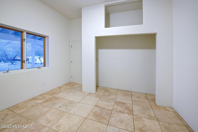 15690 N Roadrunner Ridge Ln, Tucson, AZ 85739 - unfurnished bedroom featuring light tile patterned flooring