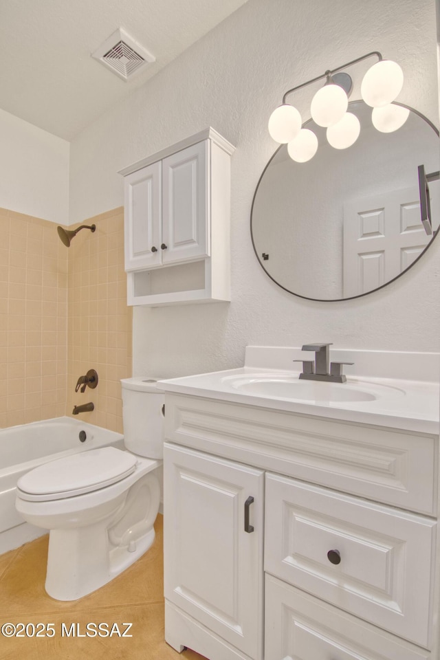bathroom with tile patterned floors, toilet, bathtub / shower combination, visible vents, and vanity