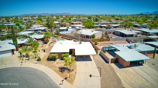 birds eye view of property featuring a residential view and a mountain view