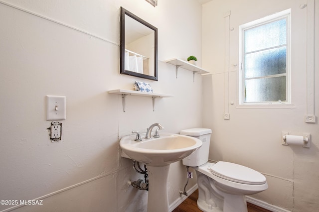 bathroom featuring toilet