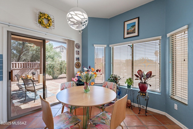 3437 S Abrego Dr, Green Valley, AZ 85614 - dining space featuring baseboards