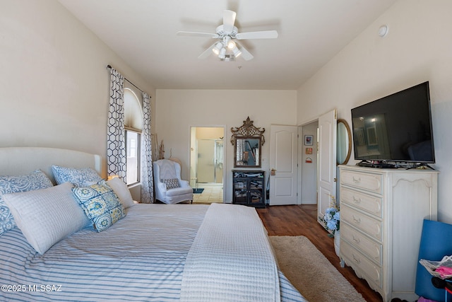 3437 S Abrego Dr, Green Valley, AZ 85614 - bedroom with ensuite bathroom, dark wood-type flooring, and a ceiling fan
