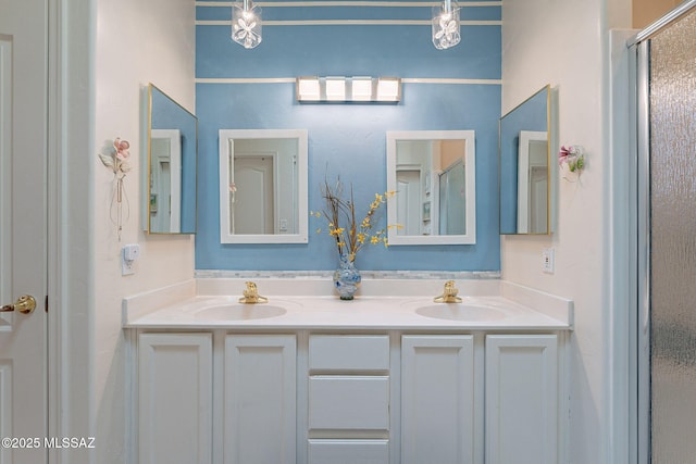 3437 S Abrego Dr, Green Valley, AZ 85614 - bathroom with an enclosed shower, double vanity, and a sink