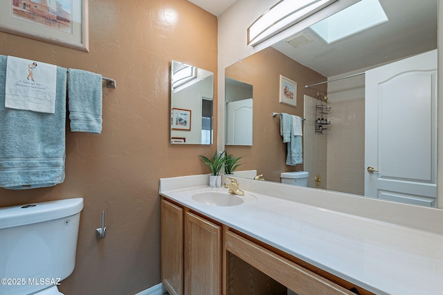 3437 S Abrego Dr, Green Valley, AZ 85614 - full bathroom with toilet, vanity, a skylight, walk in shower, and visible vents