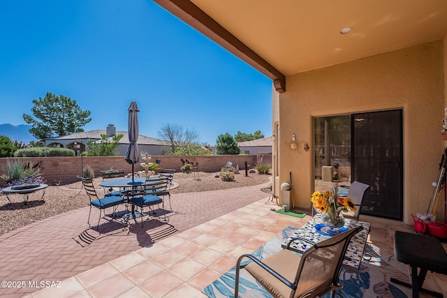 3437 S Abrego Dr, Green Valley, AZ 85614 - view of patio featuring outdoor dining space and fence