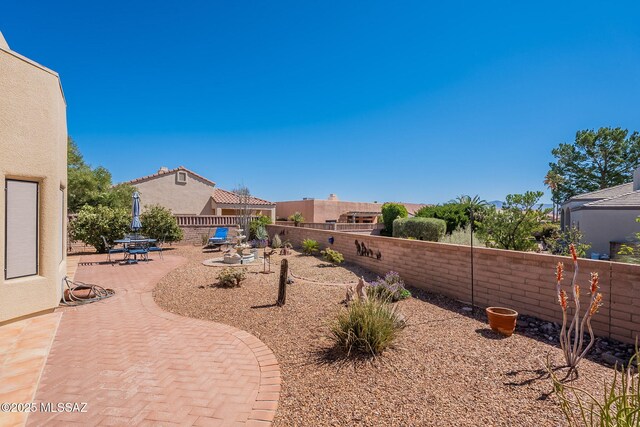 3437 S Abrego Dr, Green Valley, AZ 85614 - view of yard with a fenced backyard and a patio area