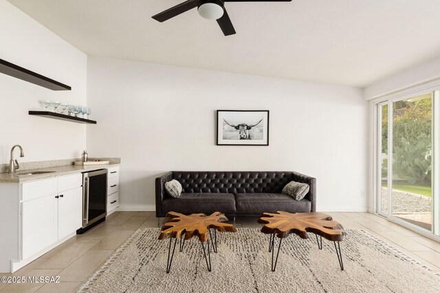 kitchen with a sink, stainless steel appliances, island exhaust hood, a wealth of natural light, and tasteful backsplash