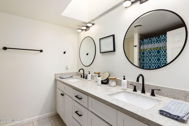 bedroom with a ceiling fan, vaulted ceiling, carpet, and baseboards