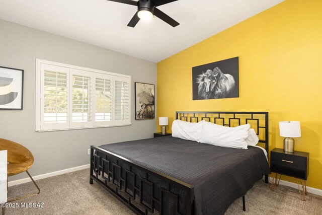 bedroom with baseboards, a ceiling fan, and carpet flooring