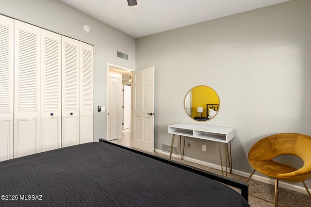 bedroom with a ceiling fan, vaulted ceiling, carpet, and baseboards