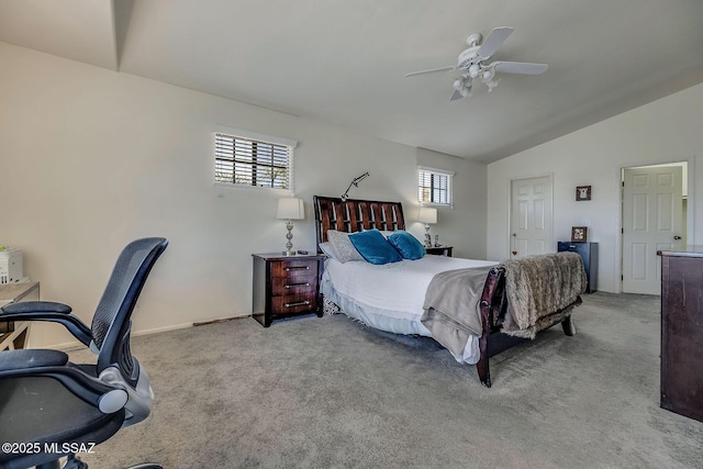 bedroom with a ceiling fan, multiple windows, light carpet, and vaulted ceiling