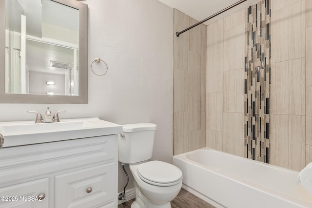 8851 E Elvenstone Way, Tucson, AZ 85730 - bathroom featuring toilet, vanity, and  shower combination