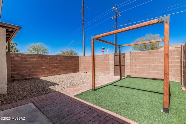 8851 E Elvenstone Way, Tucson, AZ 85730 - fenced backyard with a patio area