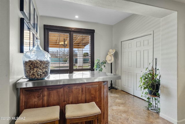3167 N Corona Pl, Nogales, AZ 85621 - office area featuring a dry bar and baseboards