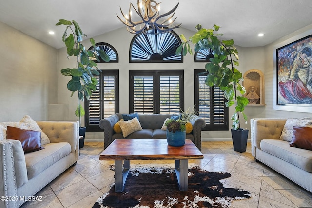 3167 N Corona Pl, Nogales, AZ 85621 - living room with stone tile floors, vaulted ceiling, recessed lighting, baseboards, and a chandelier