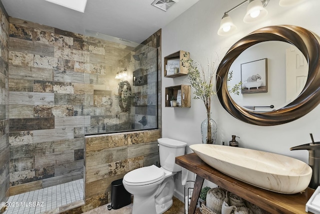 3167 N Corona Pl, Nogales, AZ 85621 - bathroom with toilet, a sink, walk in shower, and visible vents
