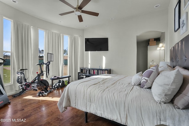 3167 N Corona Pl, Nogales, AZ 85621 - bedroom with recessed lighting, arched walkways, ceiling fan, and wood finished floors