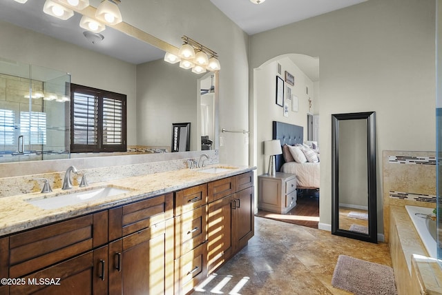 3167 N Corona Pl, Nogales, AZ 85621 - bathroom with double vanity, tiled bath, and a sink