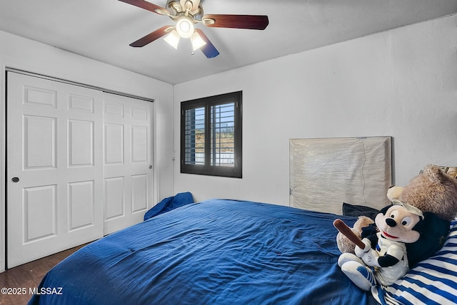 3167 N Corona Pl, Nogales, AZ 85621 - bedroom featuring a closet, wood finished floors, and ceiling fan