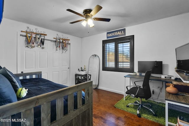 3167 N Corona Pl, Nogales, AZ 85621 - bedroom with baseboards, ceiling fan, and wood finished floors