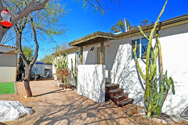 view of front of home featuring stucco siding